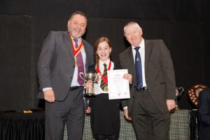 Eilidh Simmers receiving her winner’s certificate